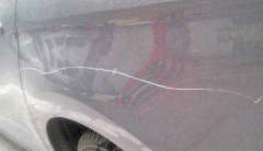 重庆女子不满占道停车 用钥匙连划4车获刑