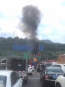 重庆一挂车三伏天里“发高烧”