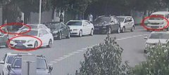 两司机玩“抢车位”发生争执 校门口大打出手