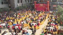 社区摆起新春“百家宴”  79岁老人主动当“席长”